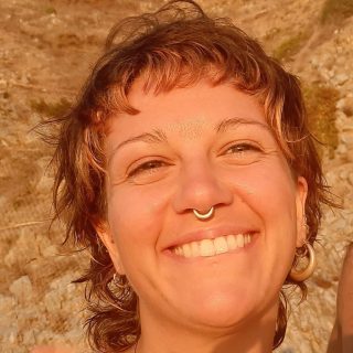 Smiling headshot of hypnotherapist